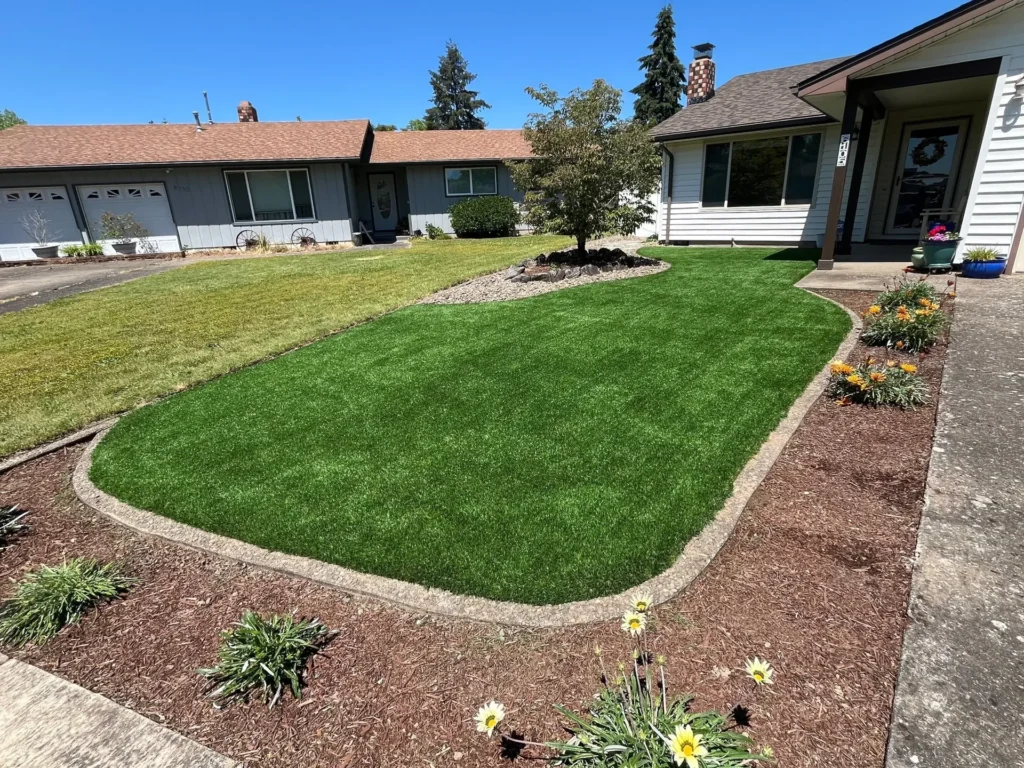 Freshly installed artificial turf lawn in a residential front yard