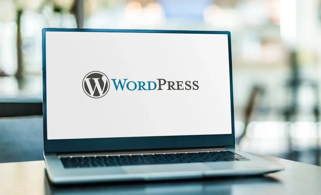 Laptop on a desk displaying the WordPress platform